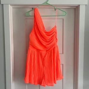 Pink Lily one shoulder romper. Size M. Bright Coral color.